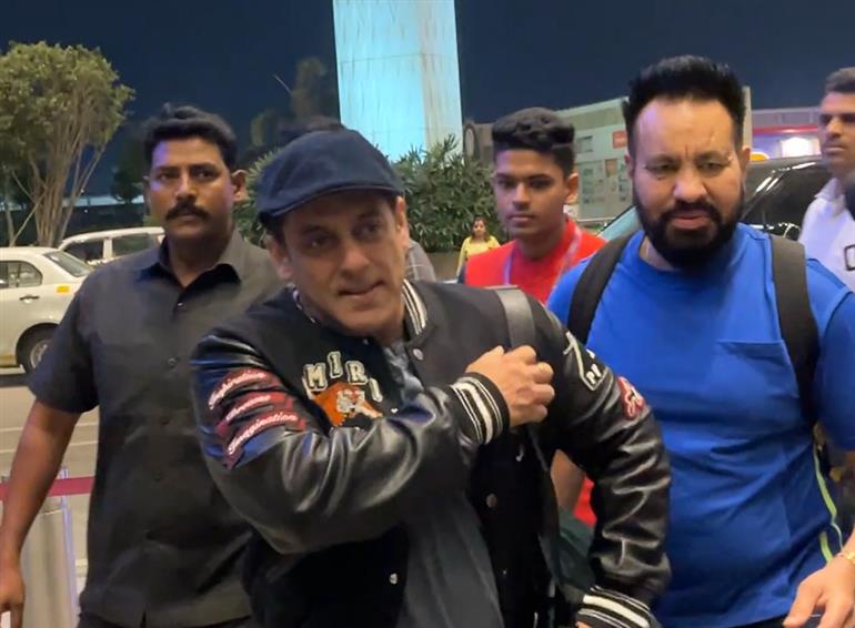 Salman Khan grabs eyeballs with his funky airport look, wears pants with his face painted on back
